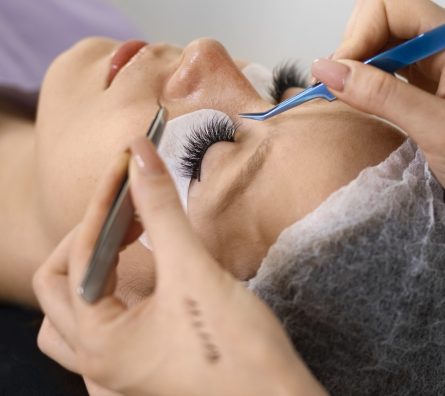 woman-wearing-eye-patches-high-angle